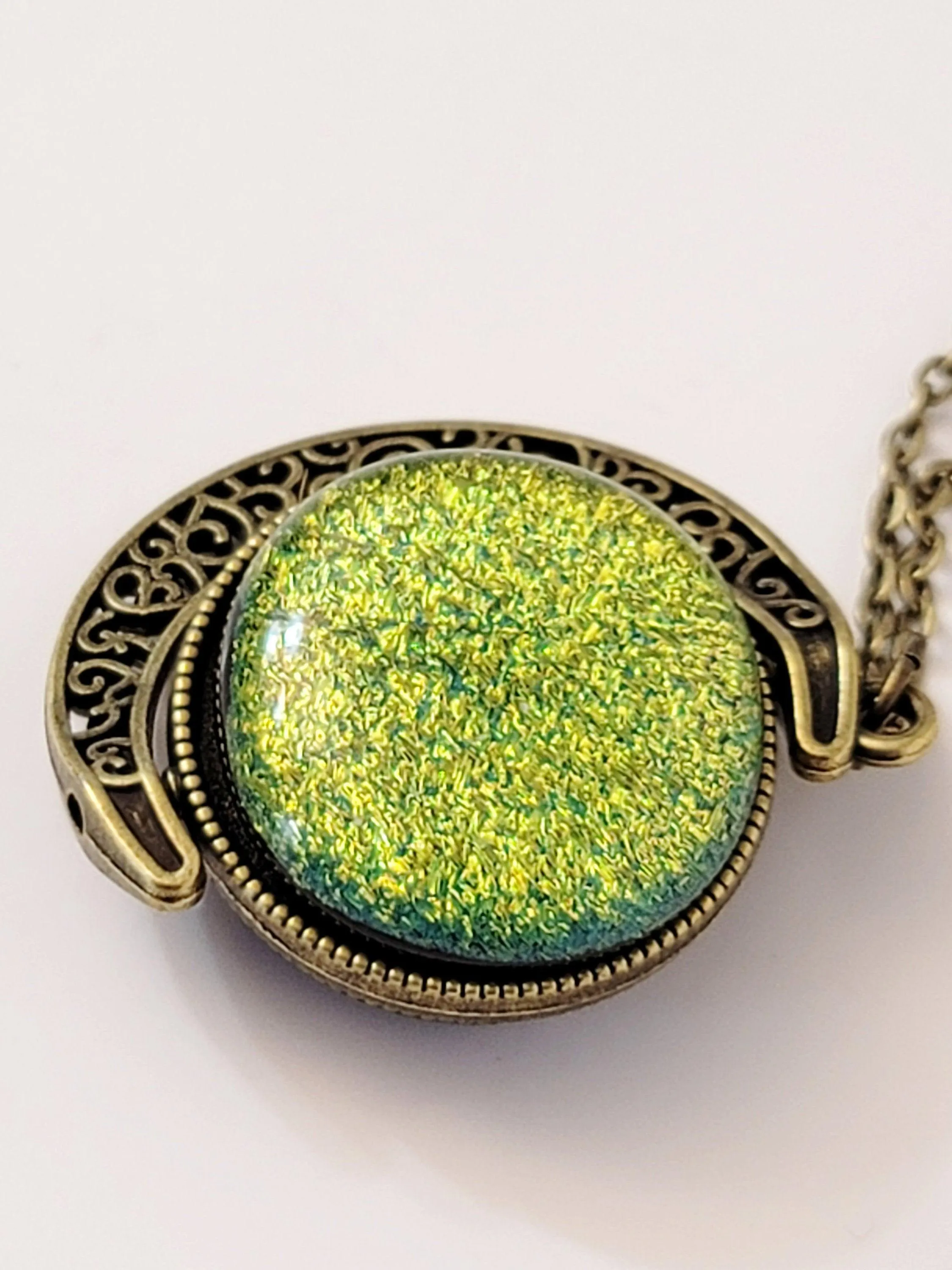 Blue and Green Dichroic Glass double sided Crescent Moon Pendant with Spinner antique bronze look on 20 inch chain