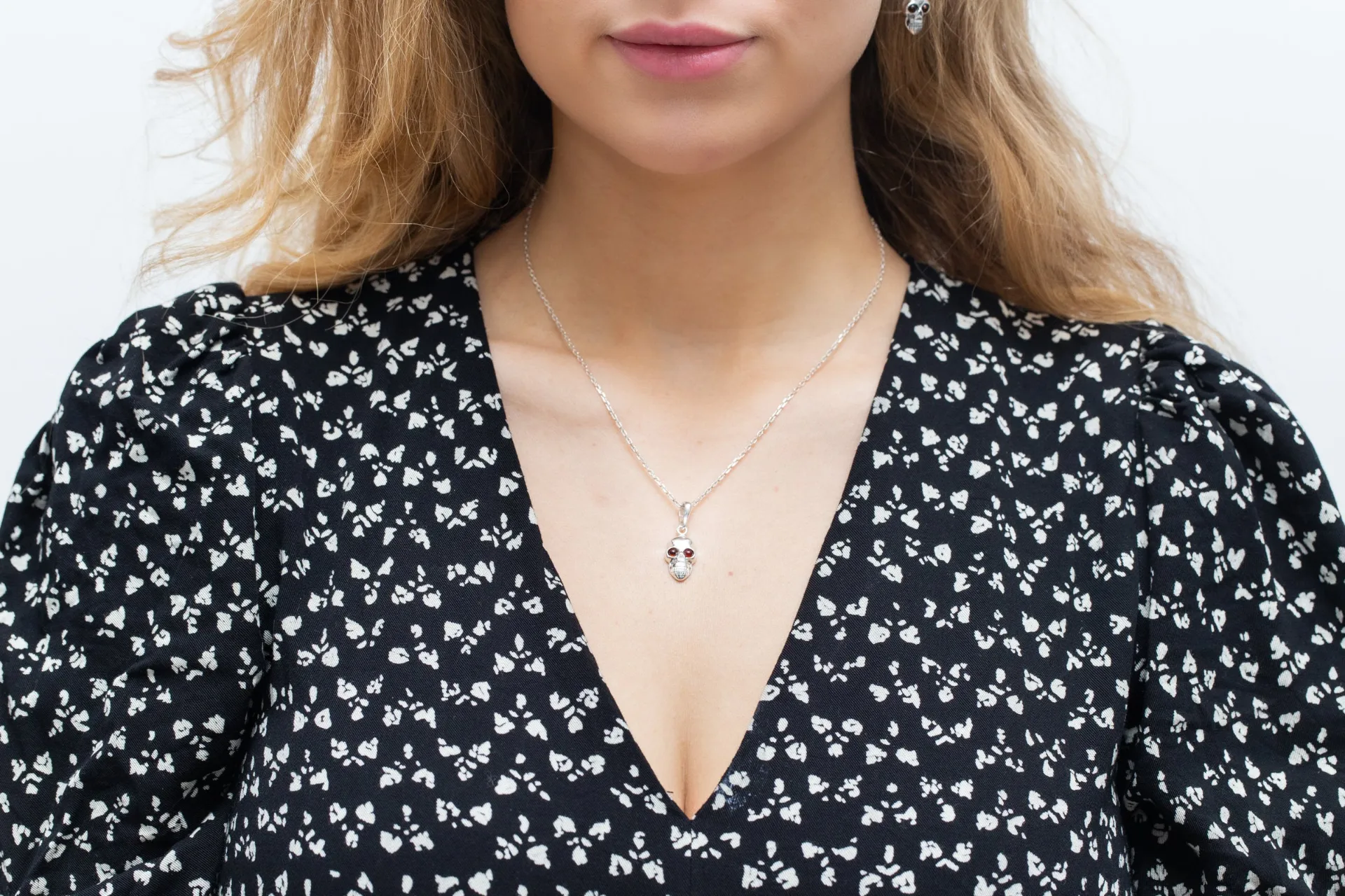 Sterling Silver Skull Necklace with Baltic Amber Stone Eyes