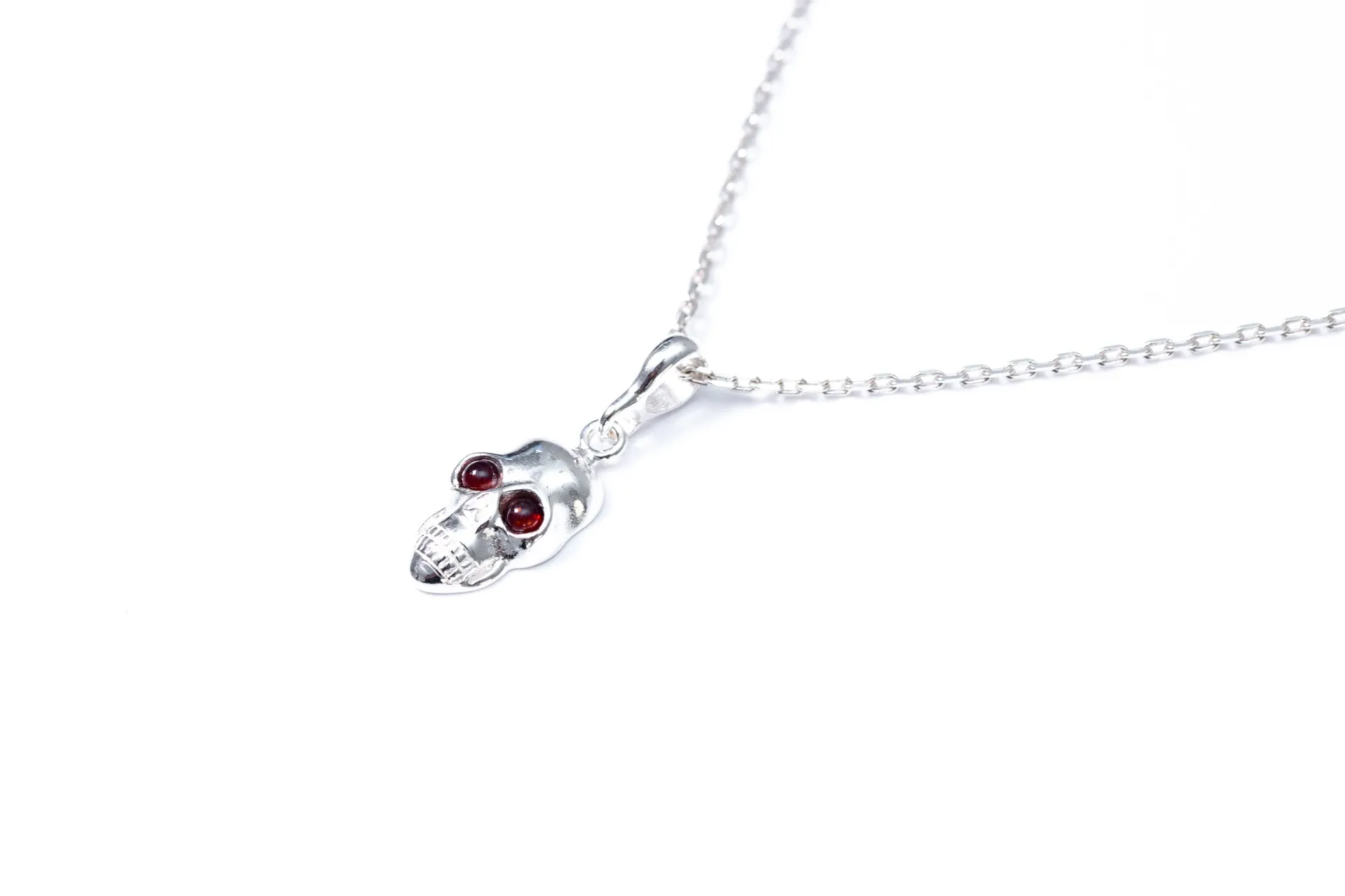 Sterling Silver Skull Necklace with Baltic Amber Stone Eyes